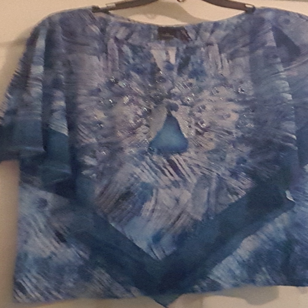 New Dimensions - Picture 2 of 3